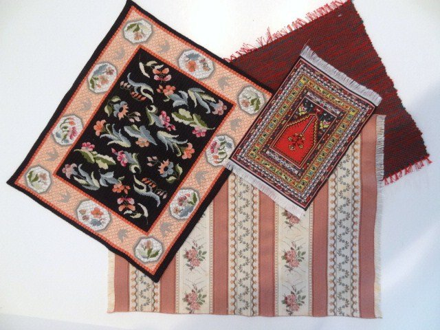 Dollhouse Carpets: A fine needlepoint carpet 8" X 9.5", a handwoven rug, small silk oriental and a carpet made from pretty upholstery fabric.