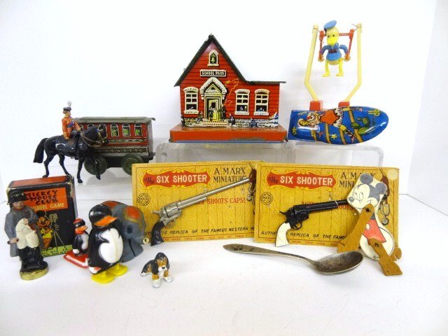 Marx Six Shooter, Tin Banks, Mickey Mouse: Grouping: Tin School Bank, Two Marx Six Shooters on original cards 5", Britians Queen Elizabeth on horse, Ramp Walkers, clicker, cards, CI Napolean, and more.