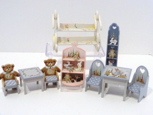 Karen Markland Nursery Furnishings: Wonderful assortment of super-cute nursery furniture including Peter Rabbit table and chairs, a pink wall shelf 2" H filled with toys, similar blue shelf and a teddy bear table and chairs, a very swee