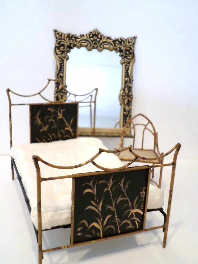 English Bamboo Bed, Chair and Mirror: Crafted by Colin and Yvonne Roberson, a metal faux bamboo bed with painted panels 4.5" H, 6.5" L, 4" W with a gothic chair by the same artists and an ornate overmantel mirror.