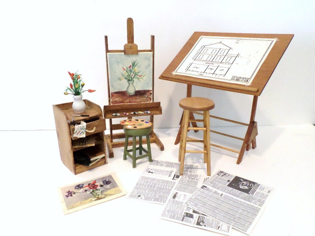 Artist and Draftsman: Appealing artist's easel 5" H and drafting table, both with works in progress, along with a painter's stand, two stools and an artist's palette. Glue residue on the bottoms of the painter's furniture.