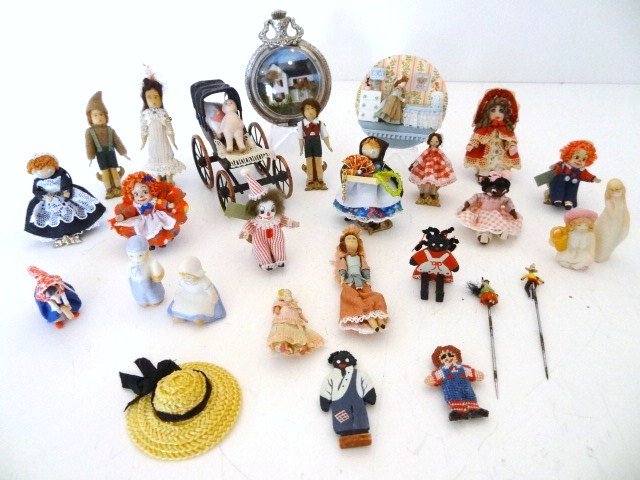 Dolls, Dolls, Dolls!: Nice assortment of miniature dolls including artisan pieces by Sally Manwell, Jean Bradley and a petitpoint Raggedy Andy by Claudia Estes. Another nice group of toys. Little house in watch case 2.5" H