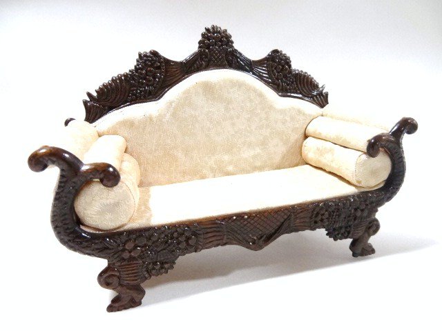 Susanne Russo West Indian Settee: A handsomely carved Victorian settee with silk upholstery. Foam cushioning has dried out. 4.25" H, 6" L.