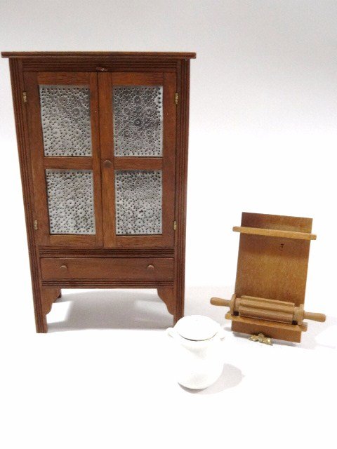 Tom Cottrell Jr. Pie Safe: Walnut pie safe with pierced tin panels 4.75" H, 2.75" W with a noodle cutter and board by the same artist (some wax) and an unsigned covered crock.