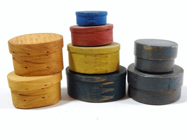 Artisan Pantry Boxes: Four stacking Shaker pantry boxes by Jim Ison, the stack 1.5" H, two unsigned blue pantry boxes and two unpainted oval boxes, also unsigned. Nice group.