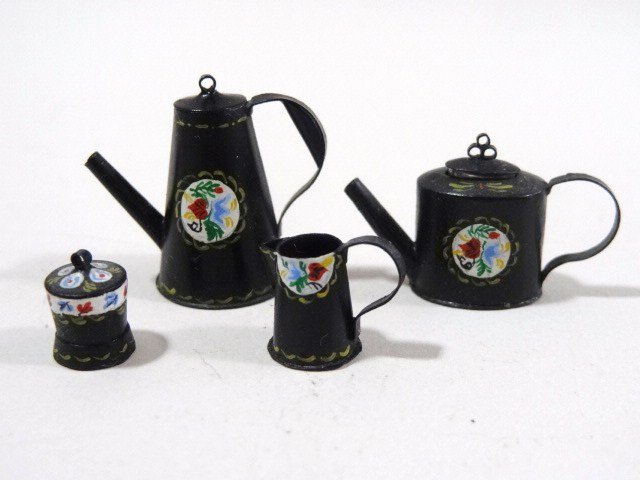 Studio B Toleware: Four painted tin items handmade and decorated by the Birkemeiers comprising a coffee pot 7/8" H, tea pot, tea caddy and small mug.