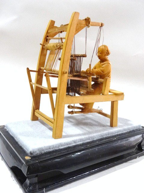 Chinese Weaver: Wonderfully hand-crafted double-harness loom with seated carved figure encased in glass on a papier mache base (some paint wear). Case 11" H, 8" W, 4.5" D.