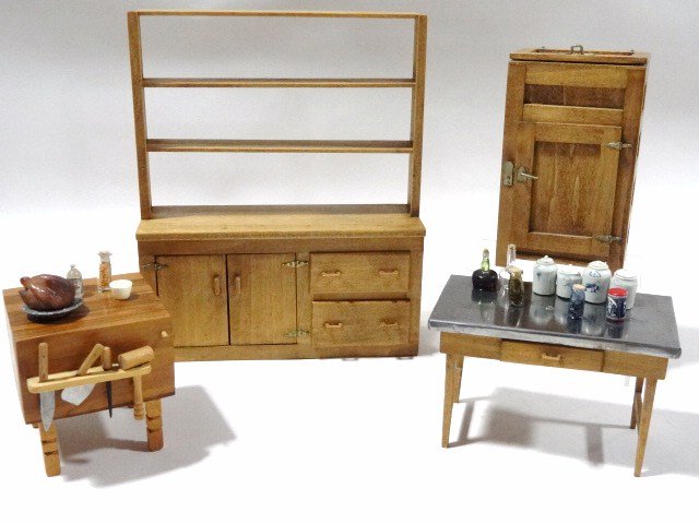 Country Kitchen Furnishings: Plain pine furniture by Paul Rouleau comprising an open dresser 7.25" H, 6" W, icebox, butcher's block and steel-topped work table with some accessories including Jean Yingling's stoneware canisters. 