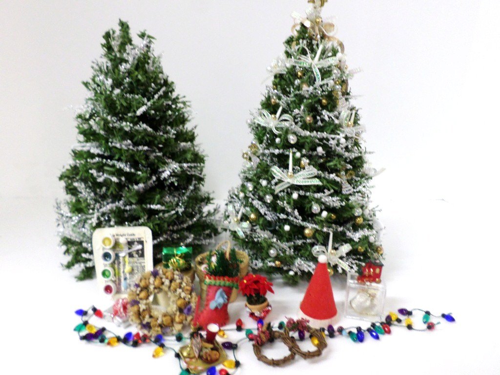 Electrified Christmas Trees: A pair of festive frosted Christmas trees with working lights 8" H with an assortment of decorations for Christmas and other holidays.