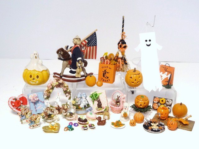 Holiday Decorations: An assortment of very nicely made decorative accessories for Halloween, Easter, Valentine's Day and Independence Day. Maureen Thomas made the sailor teddy on the rocking horse 3" H.