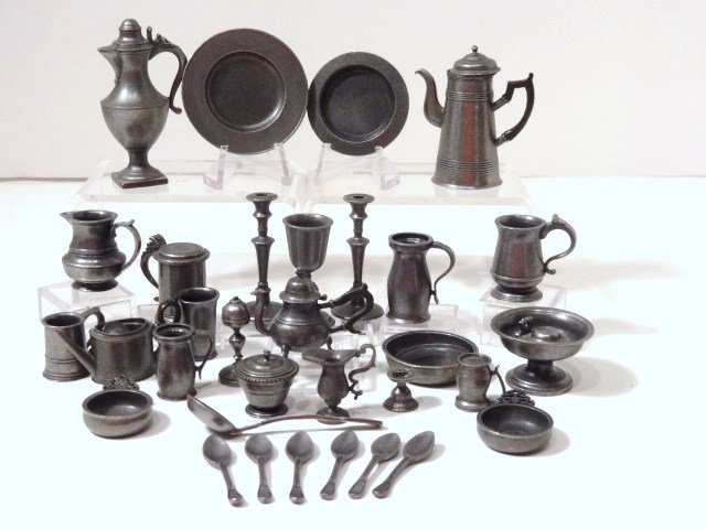 Franklin Mint Pewter Collection: Large assortment of 2" scale pewter miniatures issued as limited editions by the Franklin Mint in the early 1980's and open cupboard 13.5" H, 7" W, with certificates.