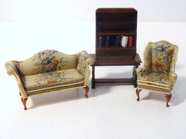 Mell Prescott Half-inch Scale Sofa and Chair: Half-scale upholstered sofa 3.25" L with matching wing chair. Also a Jeanne Chapman sofa table and a waterfall bookcase by the same artist. Lovely things.