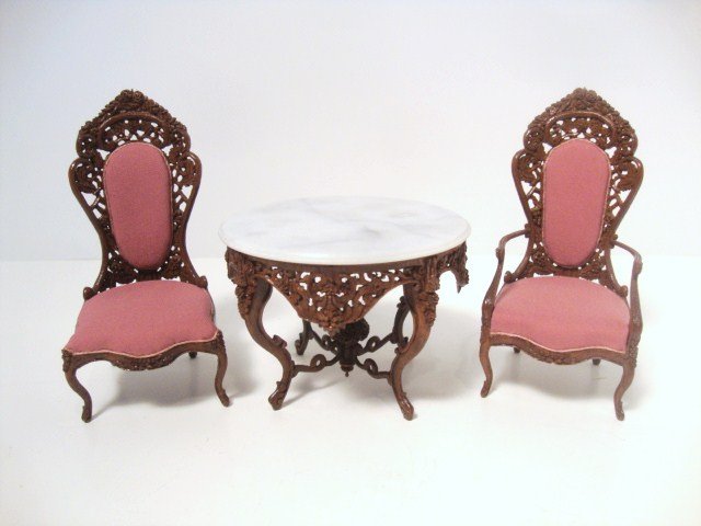 Stan Lewis Belter Table and Chairs: Stunning hand-carved marble-topped round table 2.5" H, 3.5"W with pair of upholstered chairs 4.25" H. Get out your magnifying glass to appreciate the incredibly delicate detail of the carvings.
