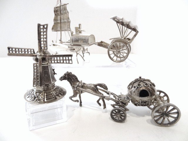 Dutch Silver Toys: Four Dutch silver toys, several hallmarked, boat marked sterling, Chinese coach wonderful Cinderella style coach 3 1/4 in. (L), windmill, 2 in.