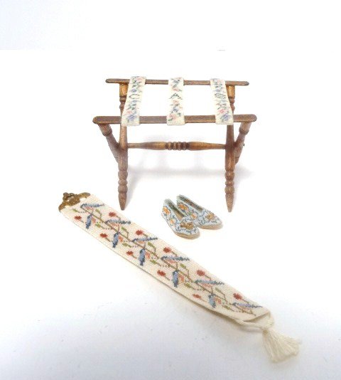 Petitpoint Bellpull and Luggage Rack: A pretty petitpoint bell pull decorated with bluebirds 4.5" L, a pair of petitpoint slippers and a sweet luggage rack with petitpoint straps bearing the initials of the consignor and probably mad by h