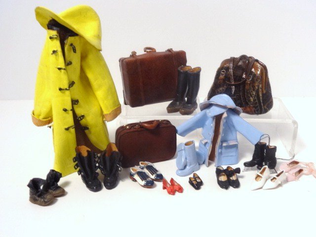 Leather Luggage, Shoes and Rainwear: Large assortment of artisan luggage including a carpet bag 1.5" H, a child and adult's slicker with hat and boots by Sylvia Rountree and a great collection of shoes, slippers and boots.
