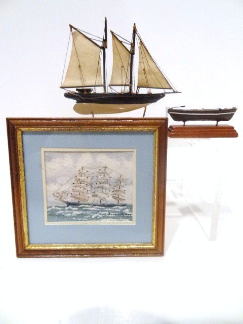 Ron Stetkowicz Ship Models: A three-masted schooner on stand 1.75" H, 2" L and a model of a skiff on stand. Wonderfully detailed, with an unsigned watercolor of a full-masted frigate, the Sea King.