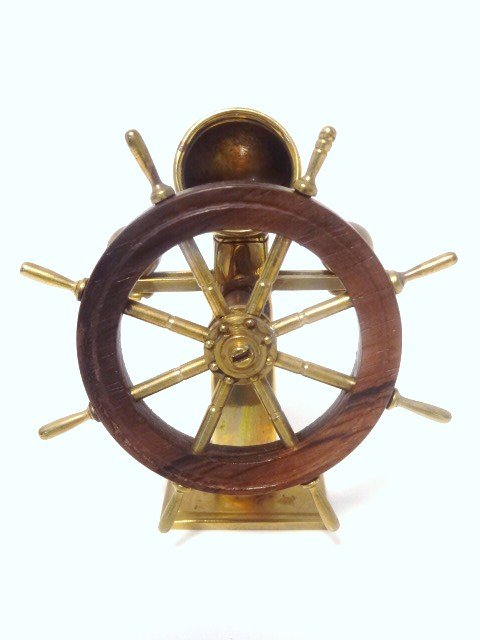 Chet Spacher Wheel and Binnacle: Very handsome ship's wheel with binnacle just under 4" H. Wheel made of rosewood and mounted on solid brass. Compass works!