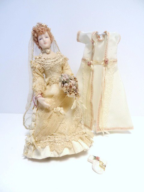 Sue Atkinson Bride: A serene young woman dressed in vintage fabrics 5.5" H by Sunday Dolls with a pretty peignoir and a few accessories. Especially pretty bouquet and headdress.