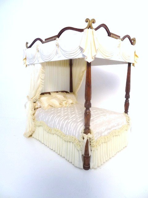 Joe Murter Sheraton Bed: A regal Sheraton bed with scrolled canopy and elaborately carved foot posts, beautifully upholstered by Judee Williamson. Exquisite. 8" H, 7" L, 5" W.