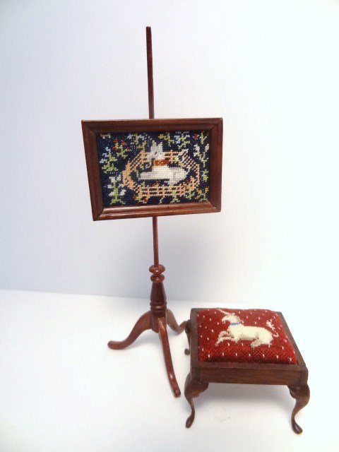 Petitpoint Unicorns: A firescreen with petitpoint image of a unicorn on a flowery mead background 5" H and a small upholstered footstool by Small Ideas, decorated with a recumbent unicorn. The cabriole legs are extremely 