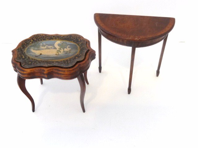 Dennis Jenvey Tables: A delicate tray table with hand-painted toleware tray 2.25" H, 2.5" L and a demilune table with spade feet and banded burlwood top. Both very elegant.