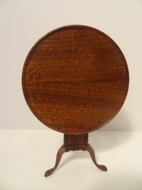 Gerald Crawford Williamsburg Table: Interesting mahogany flip-tip tripod table with cabinet base, brass locking mechanism, specially licensed by Colonial Williamsburg 2.5" H