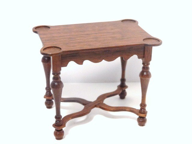 Gerald Crawford William and Mary Game Table: A mahogany game table with porringer top distinguished by recessed wells, trumpet legs, cross-bracing and scalloped apron. 2.5" H, 3" L.