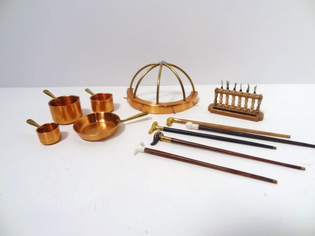 Jason Getzan Canes, Knives and Kitchenalia: An assortment of copper pots and pans with brass and copper pot rack, five canes with various decorative handles and a miniature set of various knives in a rack. Canes 2.75" L.