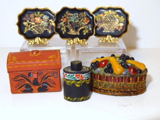 Mary Grady O'Brien Toleware: Hand-painted document box 3/4" H, just under 1" W, a Tole tea caddy, three small painted trays and a be-ribboned basket of molded fruit.