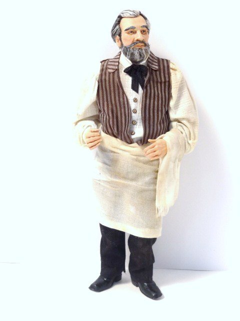 Marcia Backstrom Bartender: Rather good-looking fellow with salt and pepper hair and well-groomed beard and mustache, dressed as a later 19th century bartender. Last call! 6" H