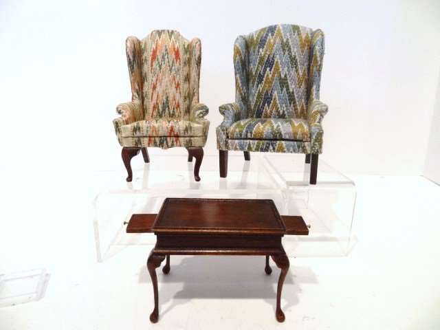 Robert Bernhard Wing Chairs: Two wing chairs from Dolphin Originals upholstered with woven fabrics simulating bargello needlework, 4.25" H. With a Queen Anne tea table with candle slides, finished by Ray Lucas.