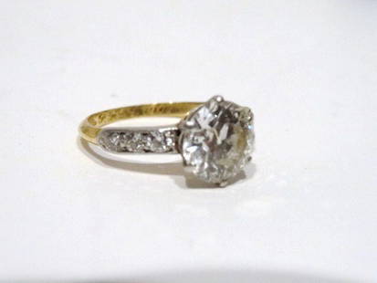 Vintage 1905 2.ct Platinum Tiffany Diamond Ring: 18kt and Platinum Tiffany & Co. Diamond Ring, Old European cut center diamond approx. (2.ct), clarity VS2, color G-H-I, accented with six approx. (.03ct) old cut diamonds, clarity VS2, color F-G-H, 3.