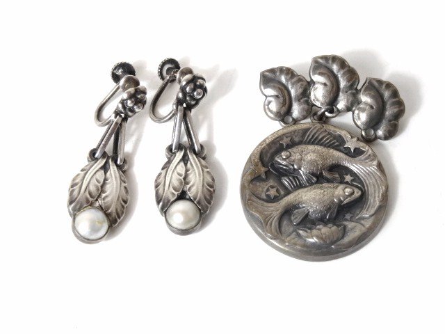 George Jensen Sterling Brooch Pin and Earrings: George Jensen Sterling fish Pin marked #217 USA and Pearl leaf earrings #23 Denmark. Weighs 25.3 g in all