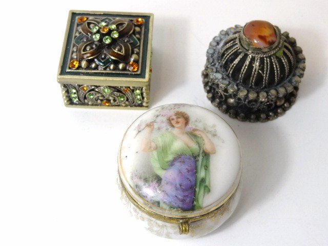 Decorative Pill Boxes: Porcelain Pin box with lady, two silver style pin boxes. 1 1/2" largest.
