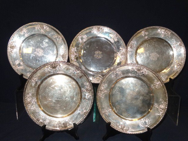 Sterling Service Plates: Matching group of 5 service plates, 11 in. (di) marked w/Watson Co's trademark Sterling 9403, pattern name NAVARRE, monogram in script at the center, 79.5 ozt