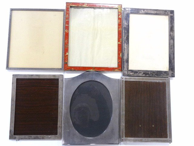Group Sterling Picture Frames: Sterling frames, 8 1/2 x 11 in., machine line engraved 7 x 10 in., rectangular frame w/oval opening machine line engraved by Lebkuecher Co. 8 x 10 in., damaged frame 8 x 10 in., all w/engraved monogra