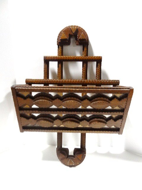 Tramp Art Magazine Rack: Very decorative three dimension Magazine Rack 19 x 18 " , interesting piece