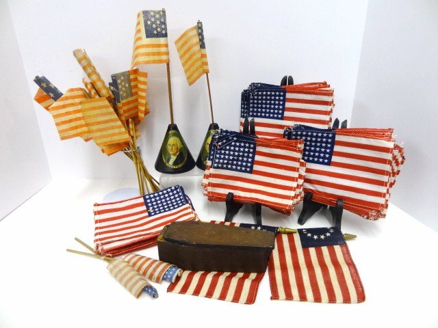 George Washington Bi-Centennial Flag holder with: Two George Washington birthday Bi-Centennial Flag Holders, approx. 30 plus flags, and miniature casket. 10 in. tallest