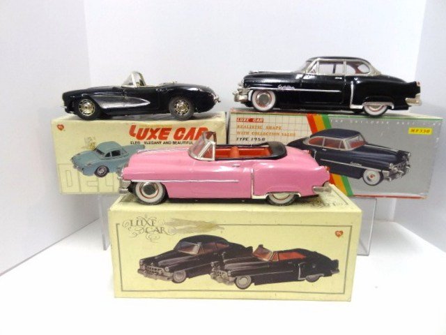 Lot of Three Tin Luxe Cars: Lot of 3 tin Luxe cars all w/original box, all friction cars, 2 Cadillacs and a Corvette, all work