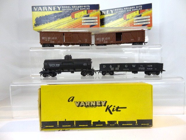 HO Train Lot of Seven Vintage Varney Cars: All cars are Varney 7 total, unbuilt caboose, boxcar, reefer, 2 boxcars (one door missing), gondola & tanker