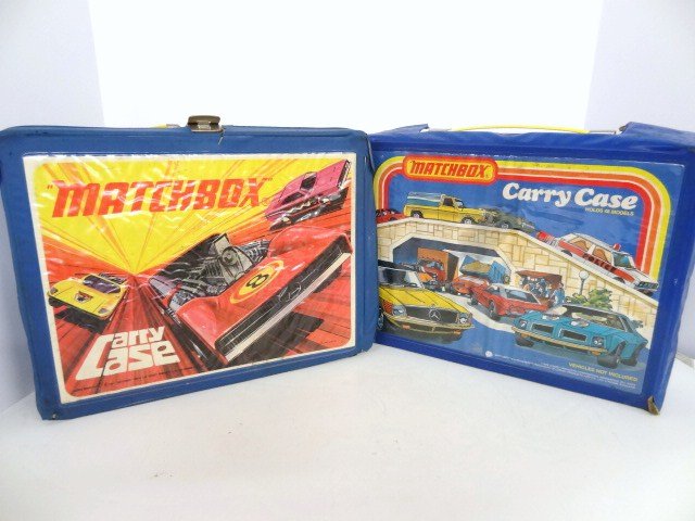Two Vintage Matchbox Carrying Cases with Miscellaneous: Two Matchbox cases w/miscellaneous vintage die cast Hot Wheels & Matchbox vehicles, played with condition, 12 1/2 in. x 9 1/2 in. x 3 in.