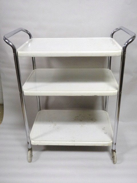 Mid-Century Serving Cart: Mid-century serving cart, 3 shelves w/white enamel finish, chrome handles & legs, original wheels, 27 1/2 in. x 16 in. x 32 1/2 in. (H) to top of handles