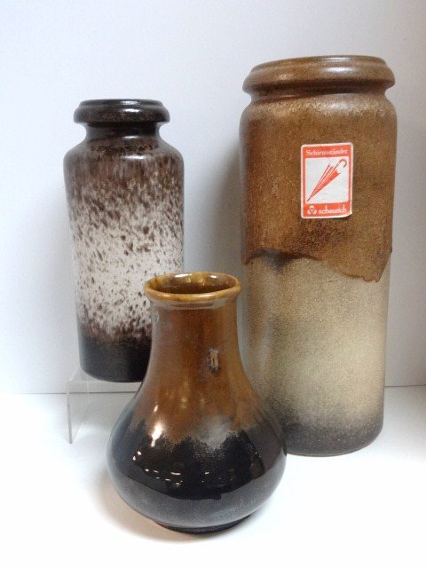 Three Pieces European Mid-Century Art Pottery: Three pcs. Of mid-century art pottery, umbrella stand (Scheurich), Fat Lava w/original label marked W. Germany 7-42 on bottom 16 1/2 in. (H), tall vase dark brown & cream glaze 12 in. (T) marked W. Ge