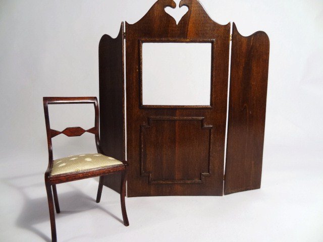 Terry Rogal Chair and Puppet Theatre: A fine mahogany Duncan Phyfe Chair with exquisitely shaped legs and figured satin upholstered seat 3" H, and Georgian puppet theatre with folding sides (one side loose from hinges) just under 6" H.