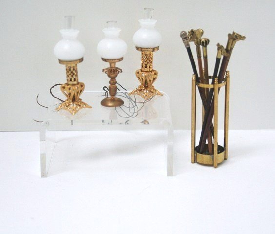 Lamps and Walking Sticks: Very nice quality brass umbrella stand 2" H (probably Ron Stetkowicz) with six handsome walking sticks and three delicate brass parlor lamps 2" H, electrified.