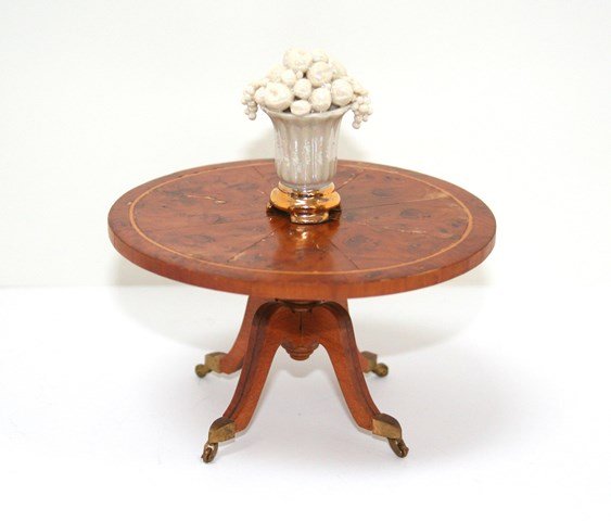 Traill-Hill Inlaid Burl Table: Artisan George IV pedestal table with inlaid burled walnut top and satinwood stringing, working brass casters 2.5" H, 4" W. Also a Vince Stapleton porcelain vase with lustered glaze. The table's top h