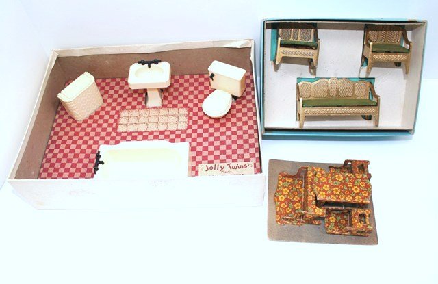 Vintage Boxed Furniture: Three sets of smaller scale vintage doll house furniture in their original boxes or packaging: Jolly Twins bathroom suite in 3/4" scale with tub measuring 4" L with a fold-out cardboard room backdrop,
