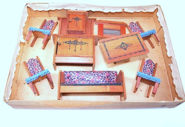 Antique Boxed Furniture: Two sets of German antique 3/4" wooden furniture in original boxes: a parlor suite with faux-grained finish and patterned paper upholstery with tables 1.75" H in wooden box with lithographed paper lab