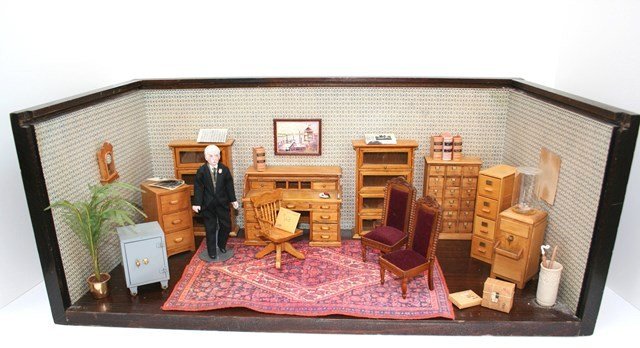 Law Office Roombox: This vintage roombox was furnished by Flora Gill Jacobs to commemorate her husband's distinguished legal career. It is furnished by many pieces crafted by Jim Gans including barrister bookcase (comes 